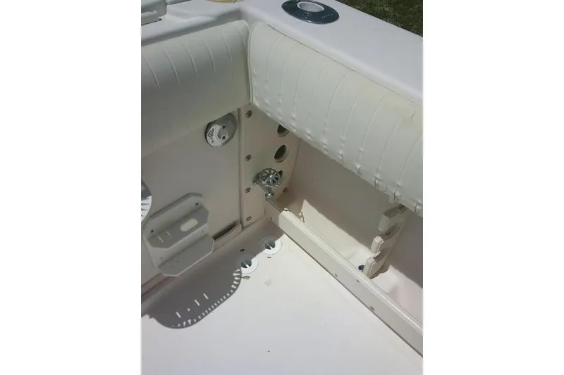 Slide: The Image of Interior view of a 2000 Grady-White Sailfish 272 boat, featuring seating and fixtures. - 25