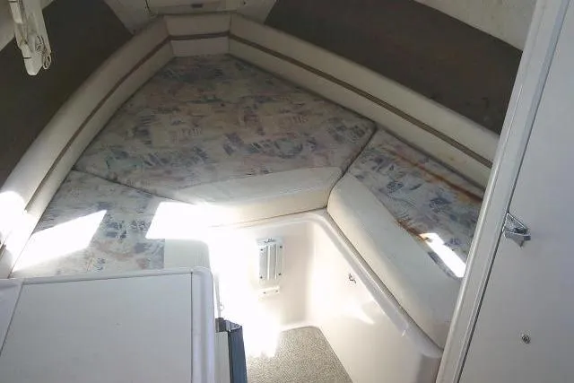 Slide: The Image of Interior cabin of 2000 Grady-White Sailfish 272 boat with cushioned seating. - 40