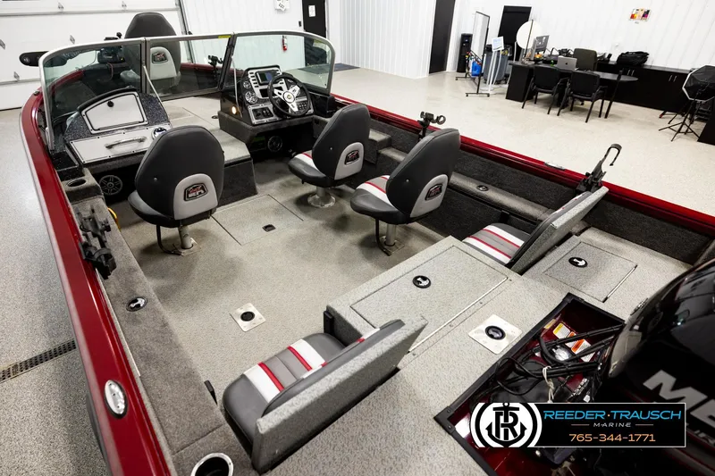 Slide: The Image of 2018 Ranger VS1882 WT boat interior with seating and control console in showroom. - 10