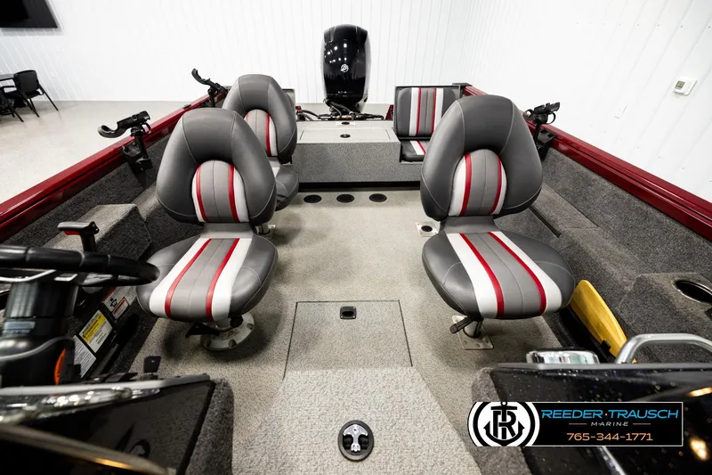 Slide: The Image of 2018 Ranger VS1882 WT boat interior with four gray and red seats. - 16