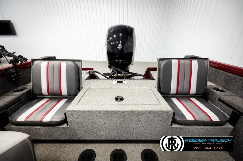 Slide: The Image of 2018 Ranger VS1882 WT boat interior with dual seats and motor, Reeder-Trausch Marine logo. - 17