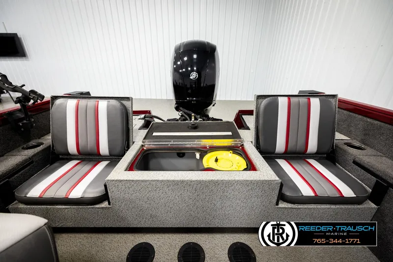 Slide: The Image of 2018 Ranger VS1882 WT boat interior with dual seats and motor, Reeder Trausch Marine branding. - 18