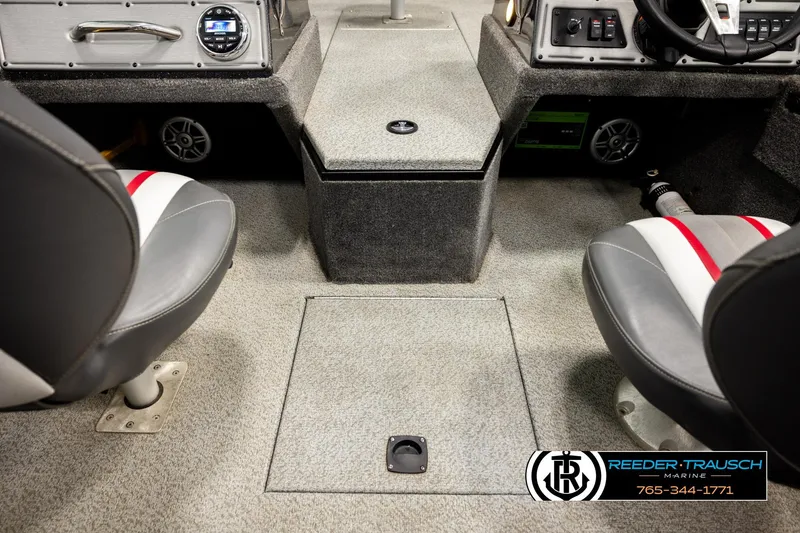 Slide: The Image of Interior of a 2018 Ranger VS1882 WT boat with seating and control panel. - 21