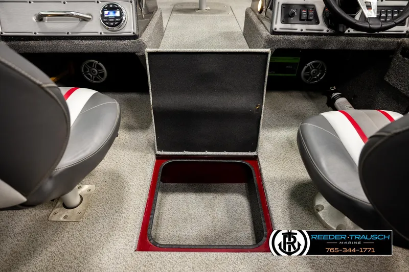 Slide: The Image of 2018 Ranger VS1882 WT boat interior with seating and storage compartment. - 22
