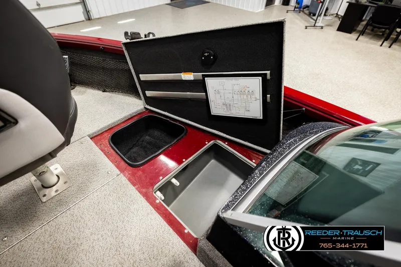 Slide: The Image of 2018 Ranger VS1882 WT boat interior with open storage compartments and wiring diagram. - 28