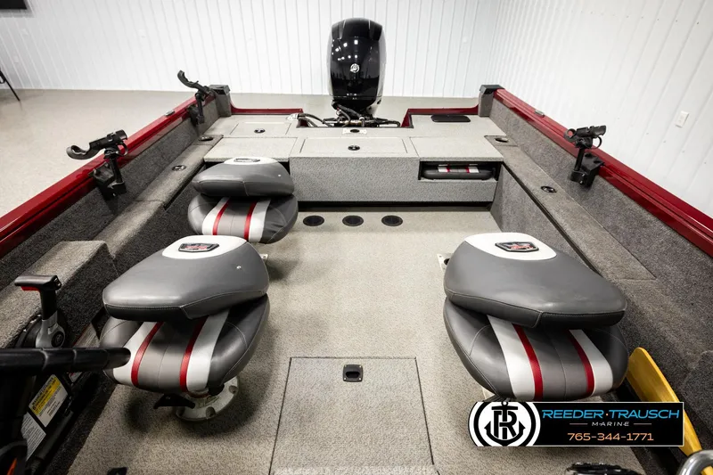 Slide: The Image of 2018 Ranger VS1882 WT boat interior with dual seats and motor, Reeder-Trausch Marine branding. - 29