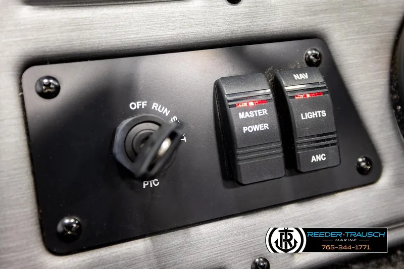 Slide: The Image of Control panel of 2018 Ranger VS1882 WT boat with switches and ignition. - 34