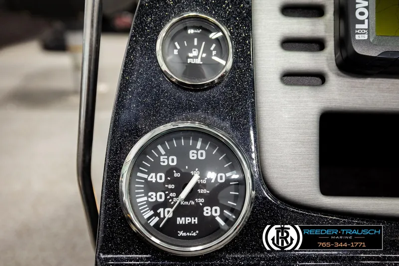 Slide: The Image of Dashboard of 2018 Ranger VS1882 WT boat with speedometer and fuel gauge. - 35