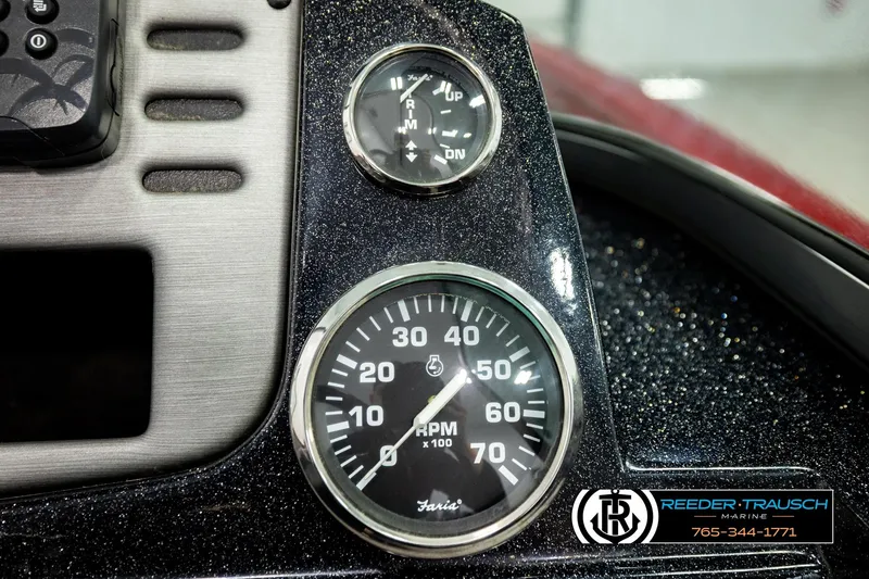 Slide: The Image of Close-up of 2018 Ranger VS1882 WT boat dashboard with RPM and trim gauges. - 37