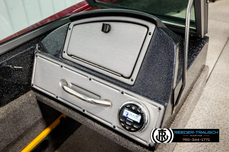 Slide: The Image of 2018 Ranger VS1882 WT boat dashboard with control panel and storage compartment. - 41