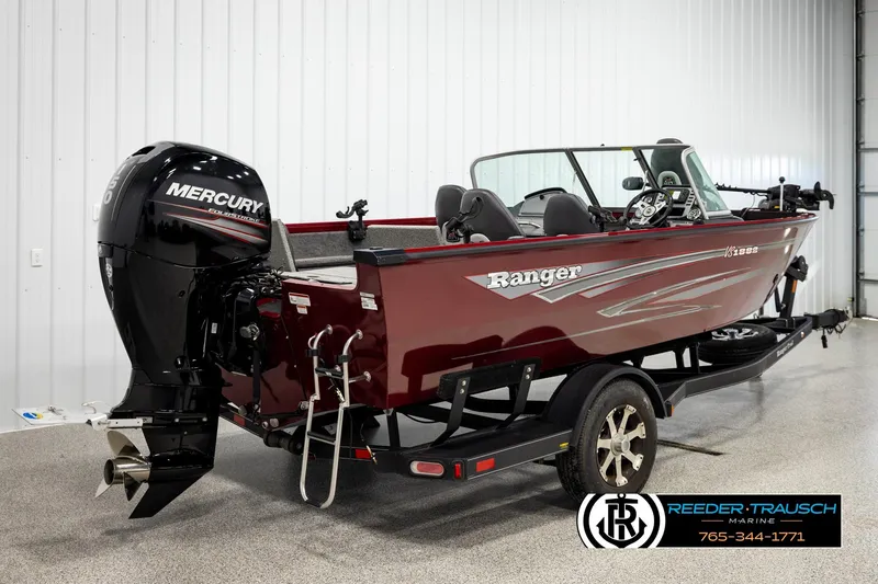 Slide: The Image of 2018 Ranger VS1882 WT boat with Mercury engine on trailer in showroom. - 5