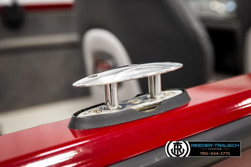 Slide: The Image of 2018 Ranger VS1882 WT boat cleat on red surface, Reeder-Trausch Marine logo visible. - 64