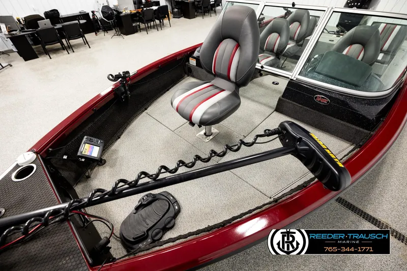 Slide: The Image of 2018 Ranger VS1882 WT fishing boat interior with seating and equipment, displayed in showroom. - 9