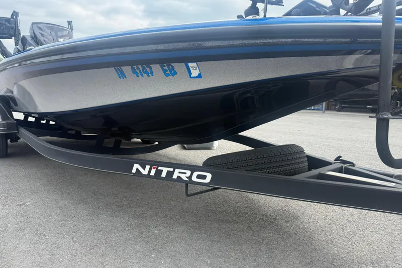 Slide: The Image of 2019 Nitro Z21 Pro boat on trailer, showcasing sleek design and branding. - 5