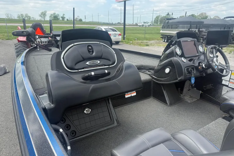 Slide: The Image of 2019 Nitro Z21 Pro boat interior with steering console and seating. - 7