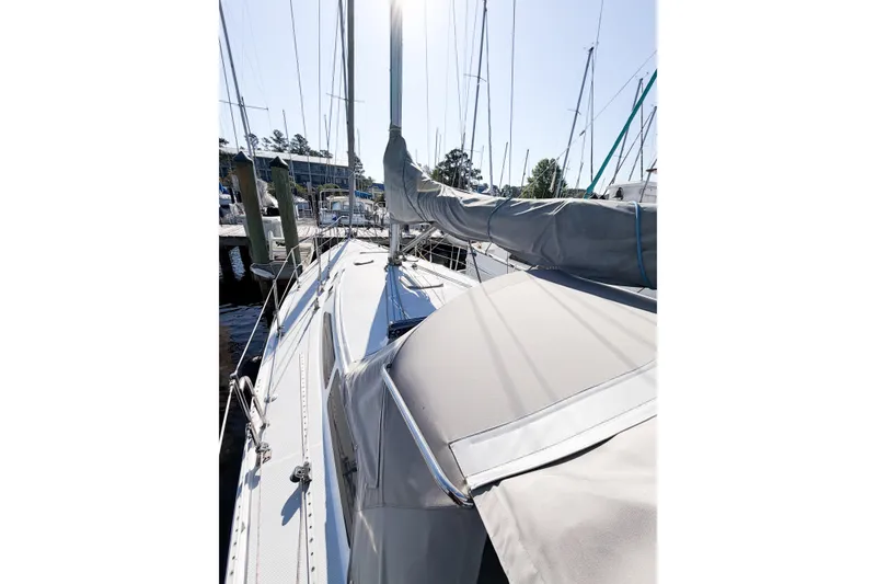 Slide: The Image of Sailboat Catalina 36 MkII 1996 docked, covered mainsail, sunny marina setting. - 12