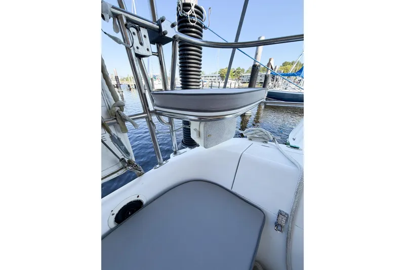 Slide: The Image of Cockpit view of a 1996 Catalina 36 MkII sailboat docked at a marina. - 18