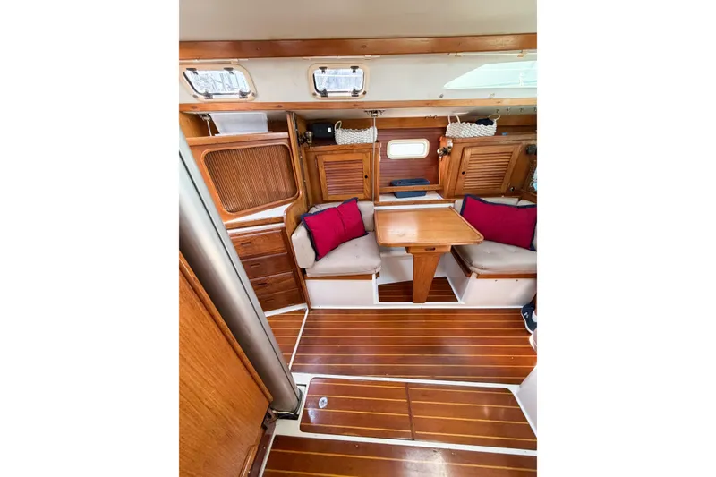Slide: The Image of Interior of 1996 Catalina 36 MkII sailboat with wooden furnishings and seating area. - 37
