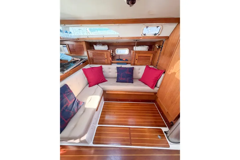 Slide: The Image of Interior of 1996 Catalina 36 MkII sailboat with cozy seating and colorful cushions. - 40