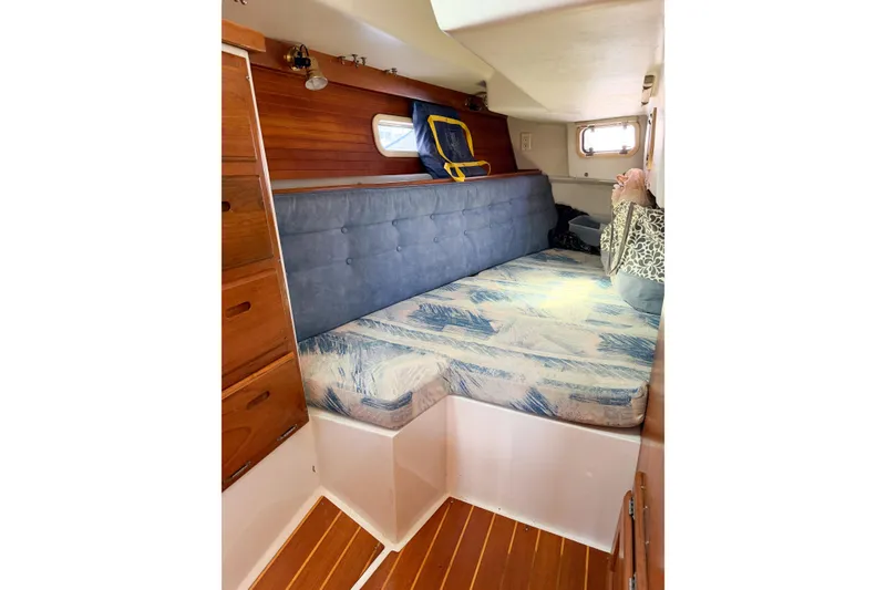 Slide: The Image of Cozy cabin interior of a 1996 Catalina 36 MkII sailboat with a comfortable berth. - 59