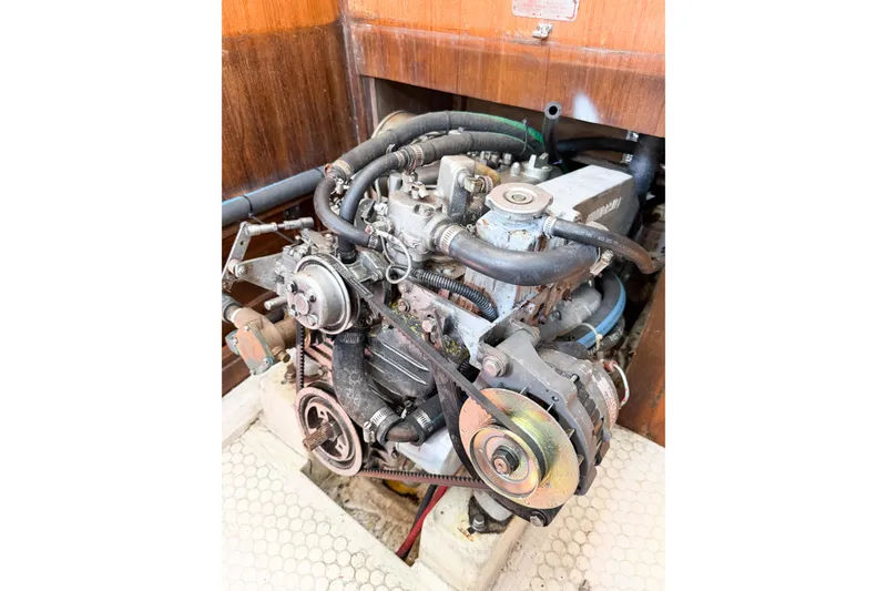 Slide: The Image of Engine of a 1996 Catalina 36 MkII sailboat, showcasing mechanical components. - 67