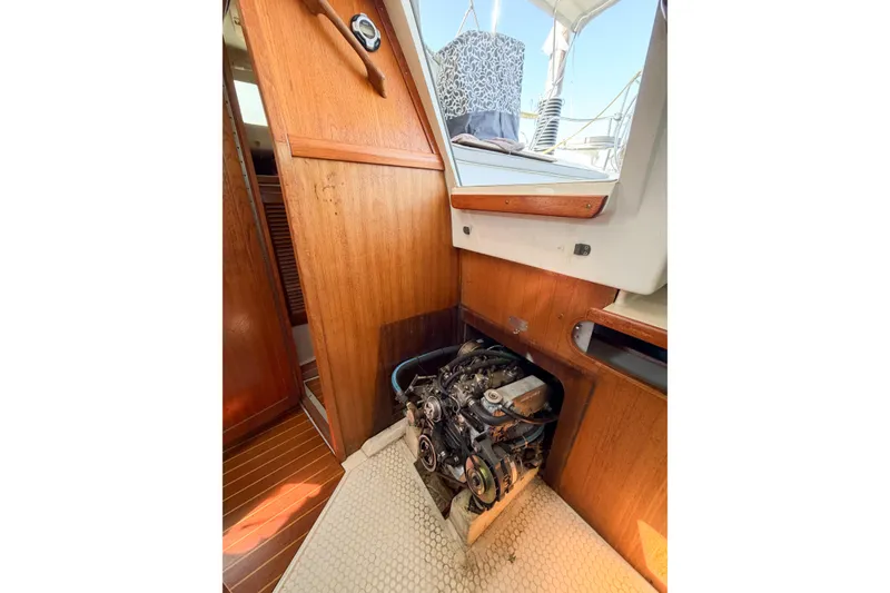 Slide: The Image of Interior view of a 1996 Catalina 36 MkII sailboat engine compartment. - 68