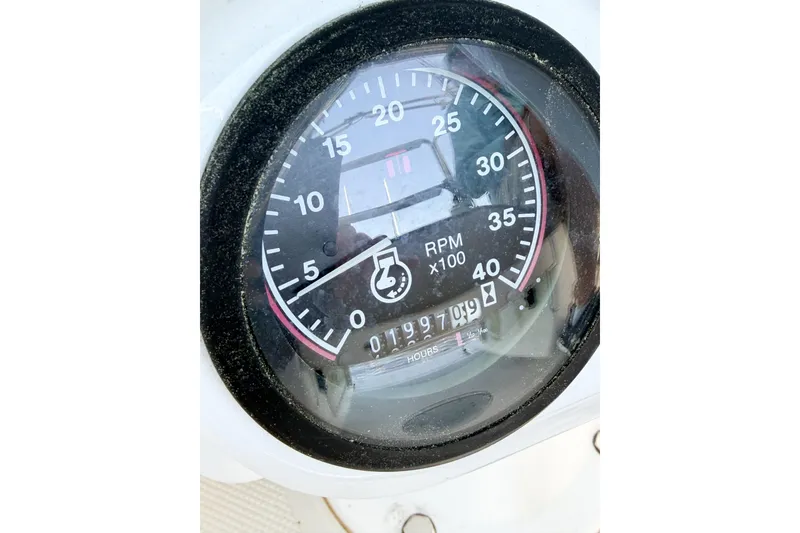 Slide: The Image of Close-up of a Catalina 36 MkII 1996 tachometer showing 1997.9 hours. - 75