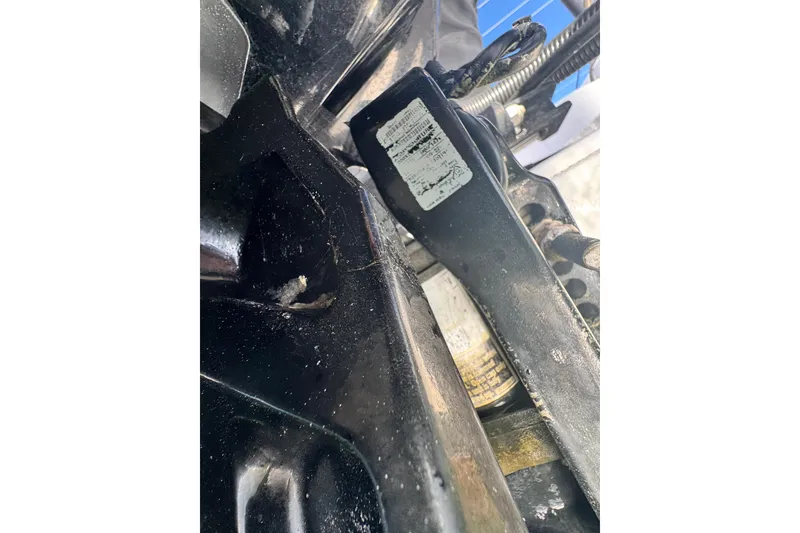 Slide: The Image of Close-up of mechanical components on a 2022 Axopar 22 T-Top boat. - 18