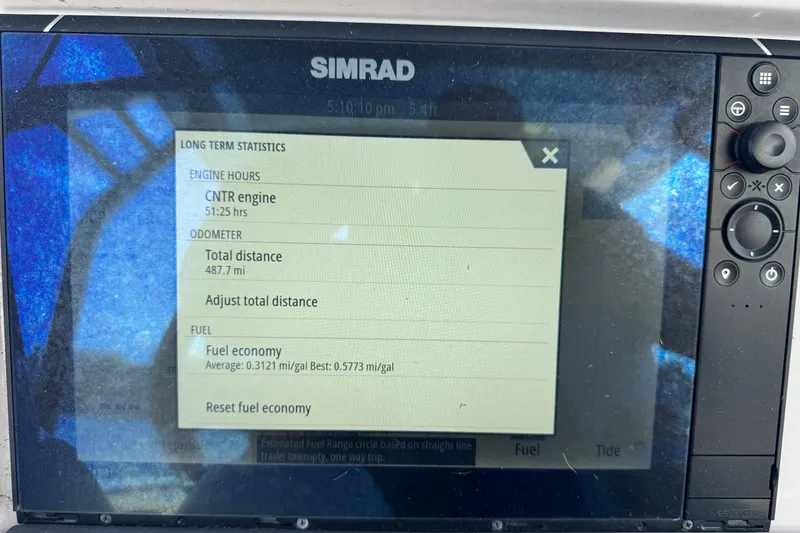 Slide: The Image of Simrad display showing Axopar 22 T-Top 2022 engine stats and fuel economy. - 7