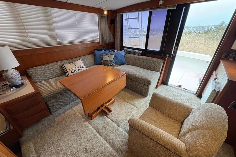 Slide: The Image of 1988 Viking 41 Convertible yacht helm with Garmin navigation and dual captain chairs. - 14