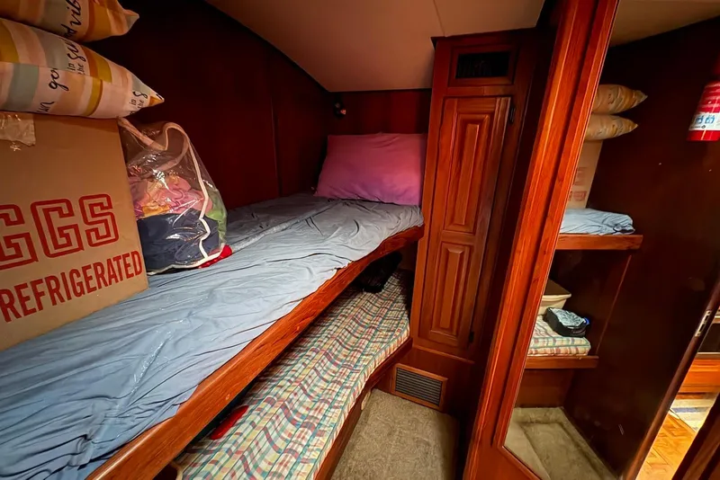 Slide: The Image of 1988 Viking 41 Convertible yacht deck with ladder and storage cabinet. - 20