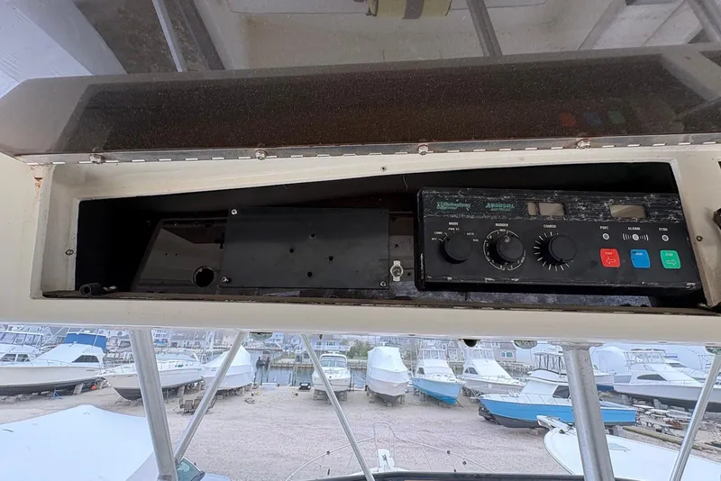 Slide: The Image of Bathroom interior of 1988 Viking 41 Convertible yacht, featuring sink and toilet. - 26