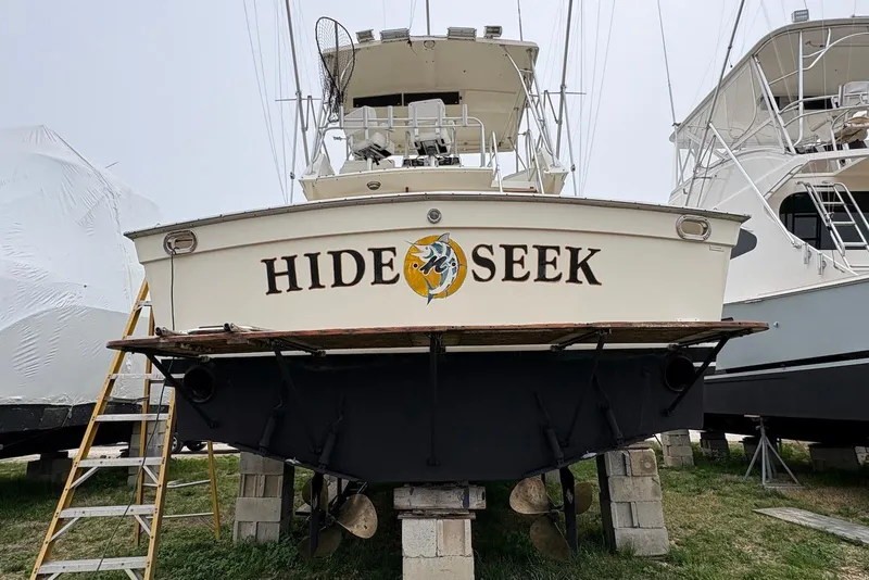 Slide: The Image of 1988 Viking 41 Convertible boat on stands, ready for maintenance or storage. - 5