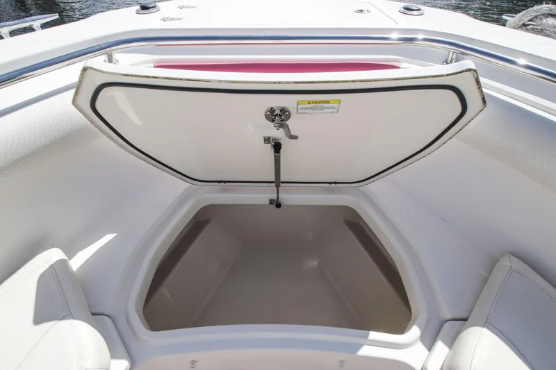 Slide: The Image of Storage compartment in the bow of a 2012 Boston Whaler 370 Outrage. - 18