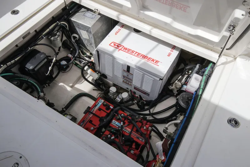 Slide: The Image of Engine compartment of 2012 Boston Whaler 370 Outrage with Westerbeke generator. - 21