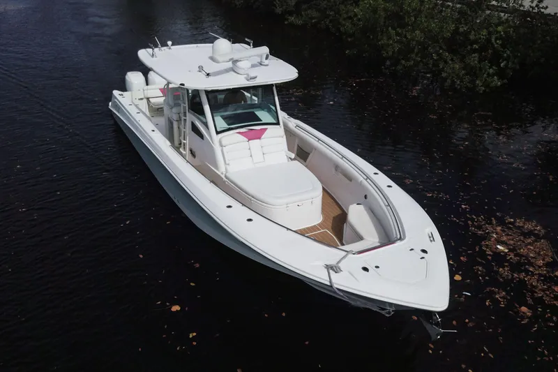 Slide: The Image of 2012 Boston Whaler 370 Outrage boat on calm water, aerial view. - 5