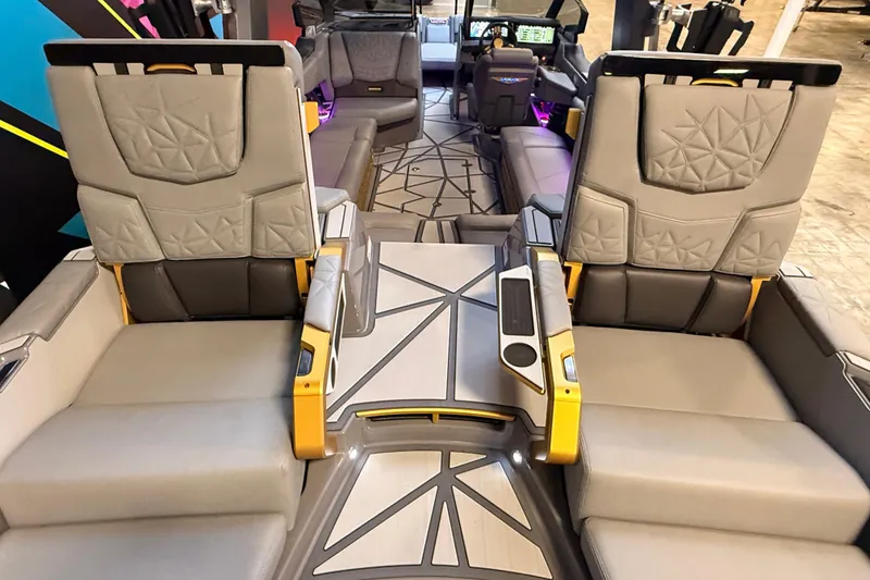 Slide: The Image of 2024 Nautique Super Air Nautique G25 Paragon interior with luxurious seating and modern design. - 18