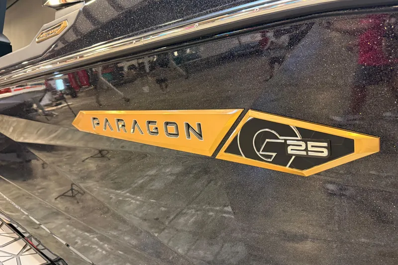 Slide: The Image of 2024 Nautique Super Air Nautique G25 Paragon logo on sleek boat exterior. - 3