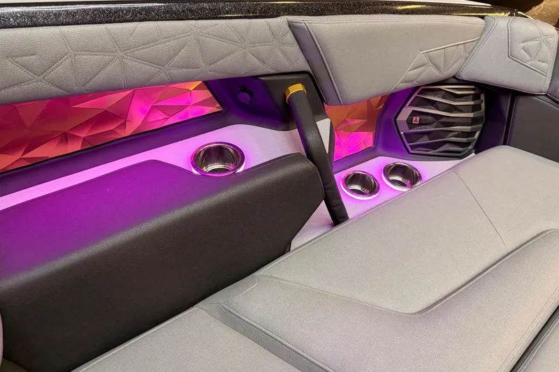 Slide: The Image of Luxurious interior of 2024 Nautique Super Air Nautique G25 Paragon with ambient lighting. - 9