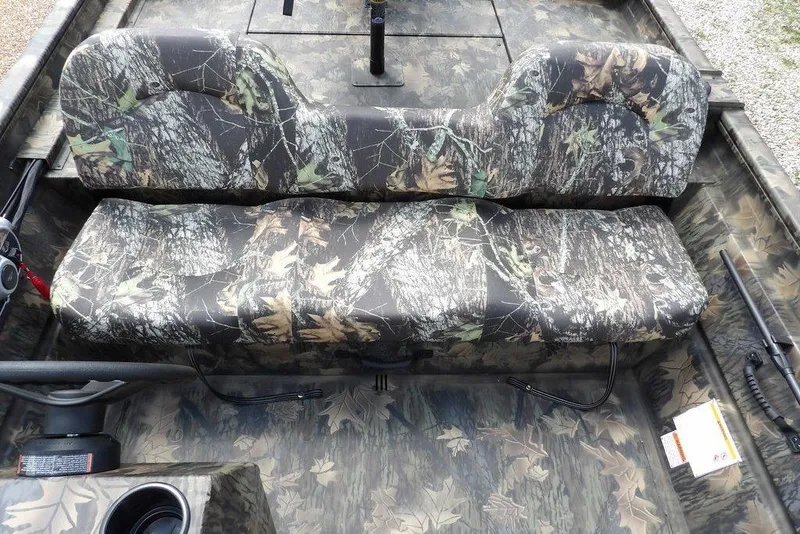 Slide: The Image of Camouflage seating in 2026 Crestliner 1860 Retriever SC boat interior. - 18