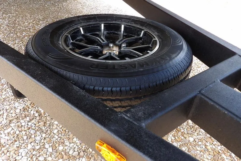 Slide: The Image of Trailer tire mounted on a Crestliner 1860 Retriever SC, 2026 model. - 31