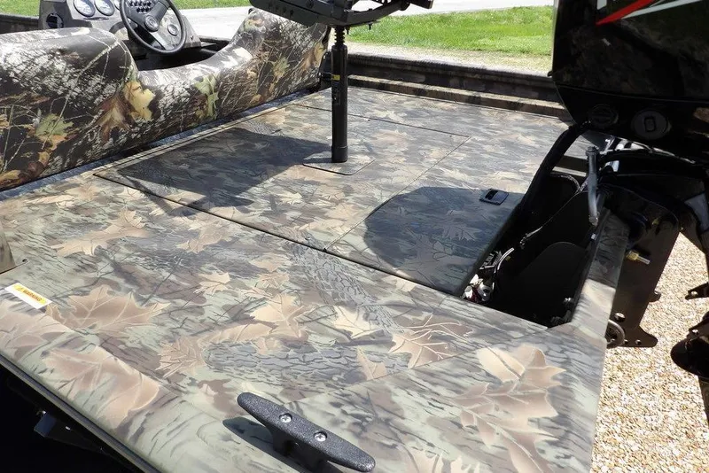 Slide: The Image of 2026 Crestliner 1860 Retriever SC boat with camouflage deck and seating. - 5