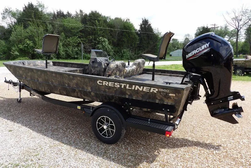 Slide: The Image of 2026 Crestliner 1860 Retriever SC boat with Mercury engine on trailer. - 8