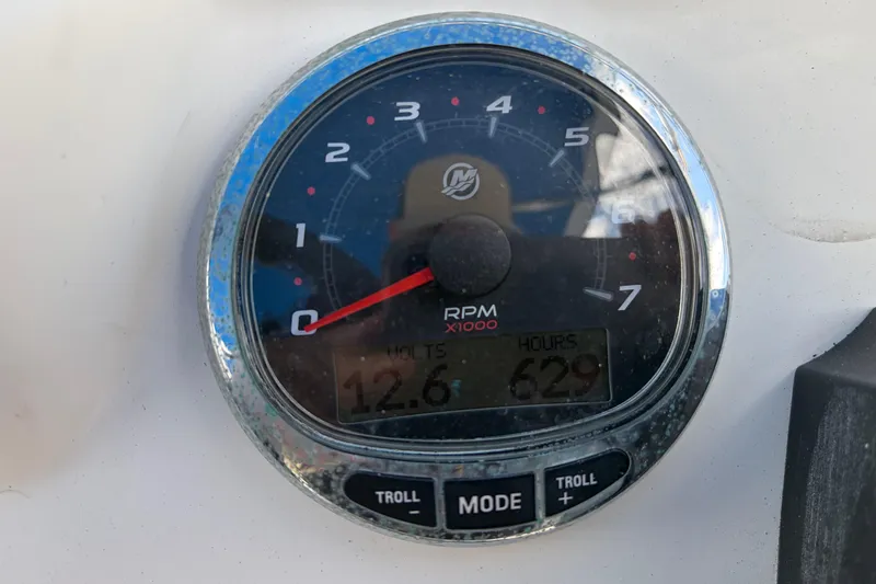 Slide: The Image of Close-up of a Zodiac N-ZO 680 tachometer displaying 12.6 volts and 629 hours. - 10