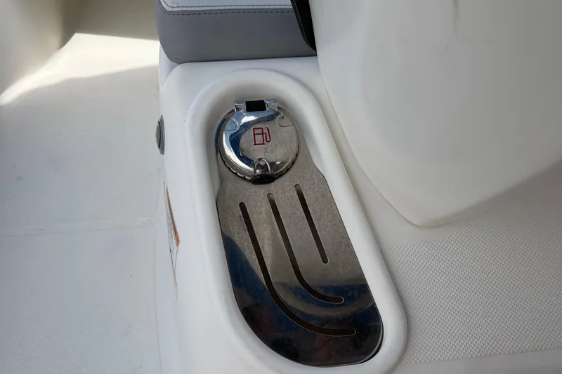 Slide: The Image of Fuel cap and footrest on 2021 Zodiac N-ZO 680 boat interior. - 14