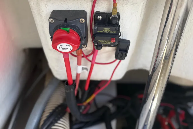 Slide: The Image of Close-up of Zodiac N-ZO 680's electrical components, featuring a BEP switch and circuit breaker. - 29