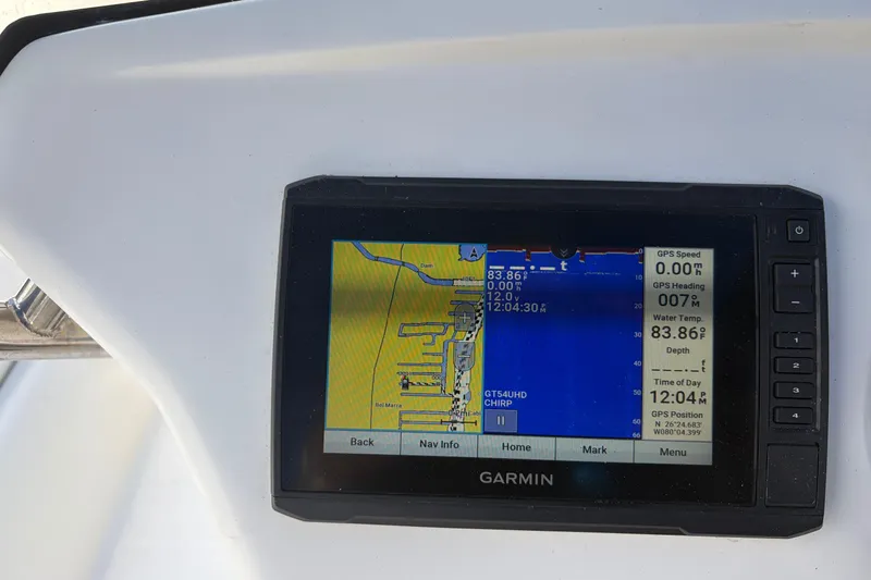 Slide: The Image of Garmin GPS display on 2021 Zodiac N-ZO 680 boat, showing navigation data. - 9