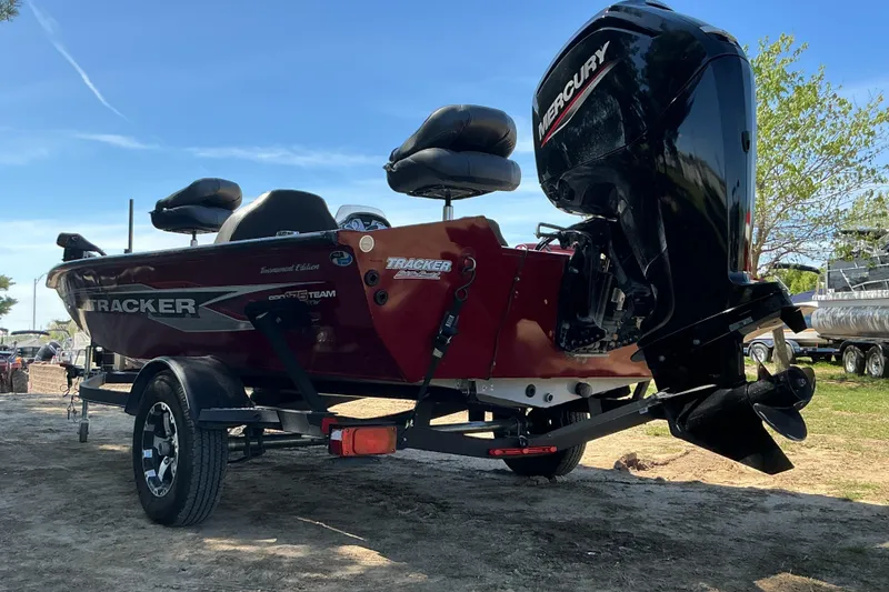 Slide: The Image of 2020 Tracker Pro Team 175 TXW Tournament Edition boat with Mercury engine on trailer. - 3