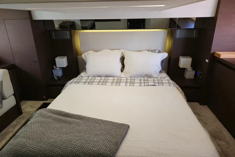 Slide: The Image of Luxurious bedroom interior of 2018 Prestige 460 yacht with elegant bedding and modern decor. - 31