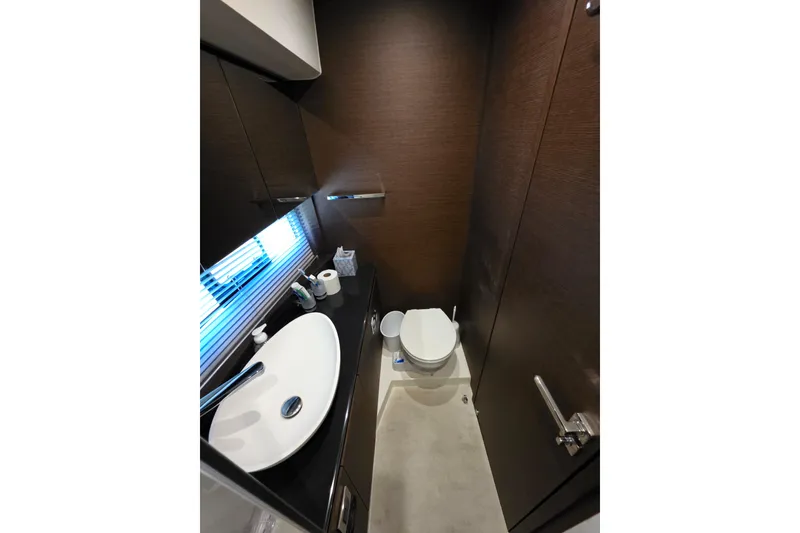 Slide: The Image of Luxurious bathroom interior of 2018 Prestige 460 yacht, featuring modern fixtures and sleek design. - 32